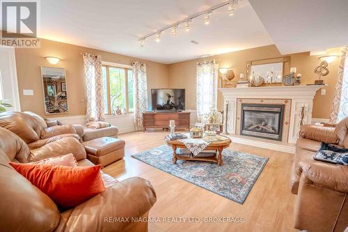 6287 Emma Street, Niagara Falls, ON - Indoor Photo Showing Living Room With Fireplace