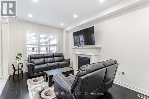 88 Humphery Street, Hamilton, ON - Indoor Photo Showing Living Room With Fireplace