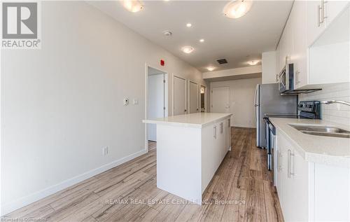 609 - 690 King Street W, Kitchener, ON - Indoor Photo Showing Kitchen With Double Sink