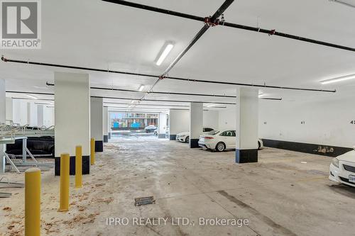 514 - 7 Erie Avenue, Brantford, ON - Indoor Photo Showing Garage