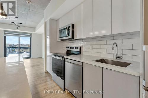 514 - 7 Erie Avenue, Brantford, ON - Indoor Photo Showing Kitchen With Upgraded Kitchen