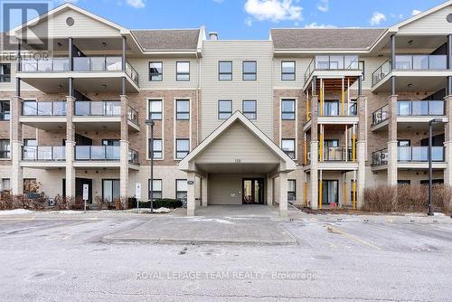 201 - 120 Prestige Circle, Ottawa, ON - Outdoor With Balcony With Facade