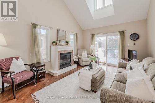 5A - 350 Doon Valley Drive, Kitchener, ON - Indoor Photo Showing Living Room With Fireplace