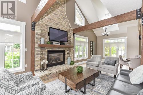 5A - 350 Doon Valley Drive, Kitchener, ON - Indoor Photo Showing Living Room With Fireplace