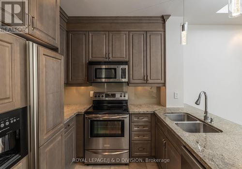 426 - 20 Burkebrook Place, Toronto, ON - Indoor Photo Showing Kitchen With Double Sink With Upgraded Kitchen