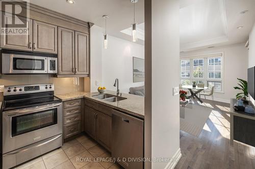 426 - 20 Burkebrook Place, Toronto, ON - Indoor Photo Showing Kitchen With Double Sink With Upgraded Kitchen