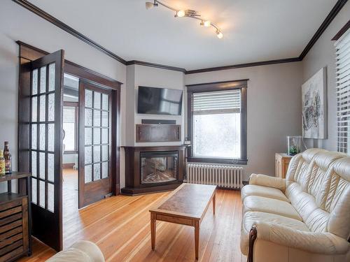 Living room - 522 1Re Rue, Saint-Jean-Sur-Richelieu, QC - Indoor Photo Showing Living Room With Fireplace