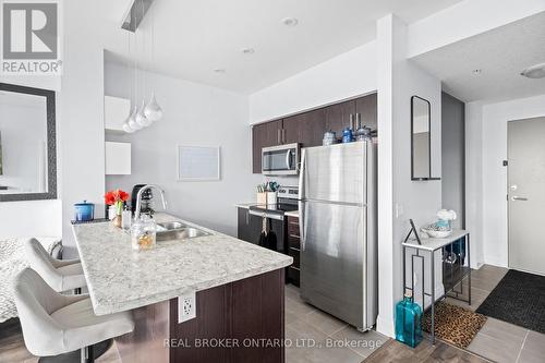 219 - 16 Concord Place, Grimsby (540 - Grimsby Beach), ON - Indoor Photo Showing Kitchen With Double Sink