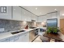 603 8538 River District Crossing, Vancouver, BC  - Indoor Photo Showing Kitchen With Stainless Steel Kitchen With Double Sink With Upgraded Kitchen 