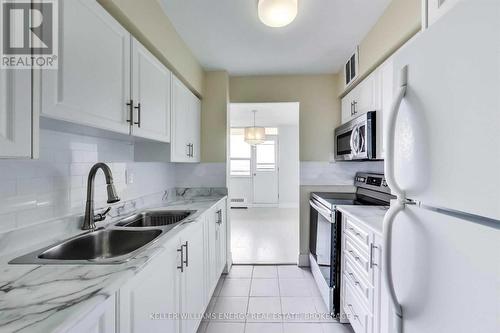 705 - 5 Frith Road, Toronto (Glenfield-Jane Heights), ON - Indoor Photo Showing Kitchen With Double Sink