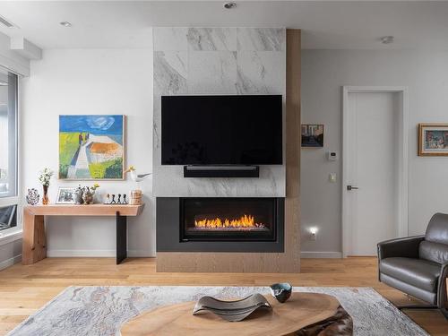 502-1201 Fort St, Victoria, BC - Indoor Photo Showing Living Room With Fireplace