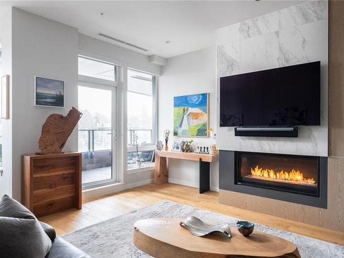 502-1201 Fort St, Victoria, BC - Indoor Photo Showing Living Room With Fireplace