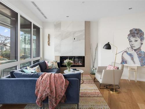 205-1201 Fort St, Victoria, BC - Indoor Photo Showing Living Room With Fireplace