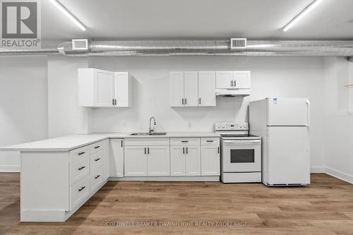 26-28 Goshen Street N, Bluewater (Zurich), ON - Indoor Photo Showing Kitchen With Double Sink