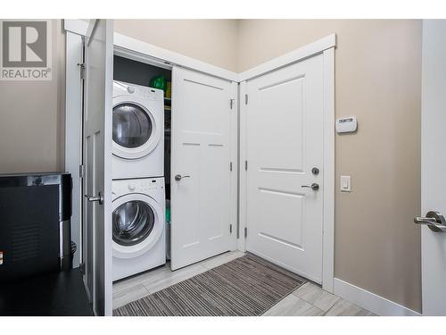 Laundry near garage/mudroom upstairs - 1836 Tower Ranch Boulevard Unit# 1, Kelowna, BC - Indoor Photo Showing Laundry Room