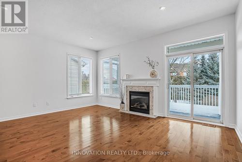 7 Eileen Crescent, Ottawa, ON - Indoor Photo Showing Living Room With Fireplace