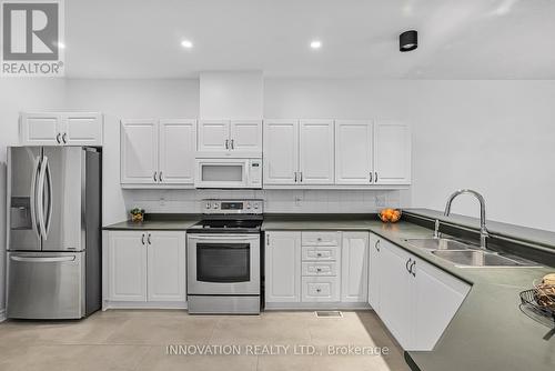 7 Eileen Crescent, Ottawa, ON - Indoor Photo Showing Kitchen With Double Sink