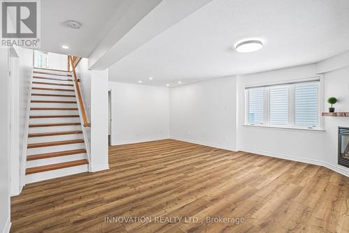 7 Eileen Crescent, Ottawa, ON - Indoor Photo Showing Other Room With Fireplace