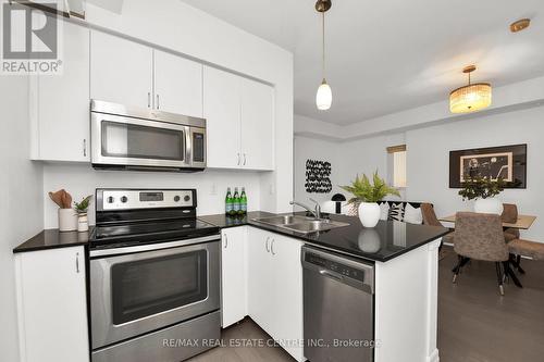 302 - 58 Macaulay Avenue, Toronto, ON - Indoor Photo Showing Kitchen With Double Sink