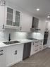 5187 Oscar Peterson Boulevard, Mississauga, ON  - Indoor Photo Showing Kitchen With Double Sink With Upgraded Kitchen 