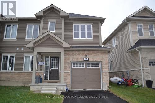 67 Oakmont Drive, Loyalist, ON - Outdoor With Facade