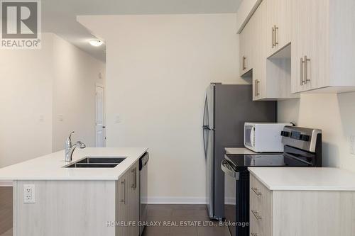 67 Oakmont Drive, Loyalist, ON - Indoor Photo Showing Kitchen With Double Sink