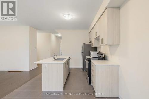 67 Oakmont Drive, Loyalist, ON - Indoor Photo Showing Kitchen With Double Sink