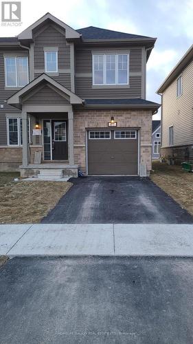 67 Oakmont Drive, Loyalist, ON - Outdoor With Facade