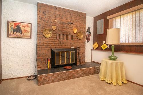 11 Caro Road, Kelowna, BC - Indoor Photo Showing Other Room With Fireplace