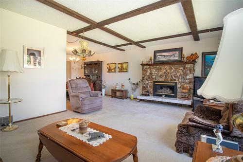 11 Caro Road, Kelowna, BC - Indoor Photo Showing Living Room With Fireplace