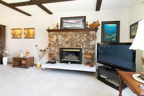 11 Caro Road, Kelowna, BC - Indoor Photo Showing Other Room With Fireplace