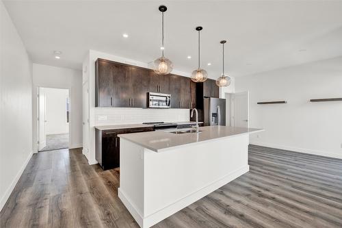 338-610 Academy Way, Kelowna, BC - Indoor Photo Showing Kitchen With Stainless Steel Kitchen With Upgraded Kitchen