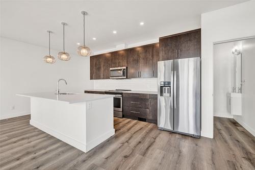 338-610 Academy Way, Kelowna, BC - Indoor Photo Showing Kitchen With Stainless Steel Kitchen With Upgraded Kitchen