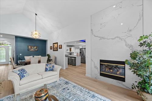 4187 Gallaghers Crescent, Kelowna, BC - Indoor Photo Showing Living Room With Fireplace