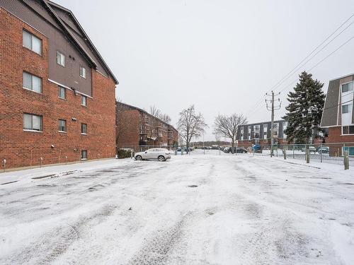 Parking - 303-3175 Rue Des Émeraudes, Longueuil (Saint-Hubert), QC - Outdoor With Exterior