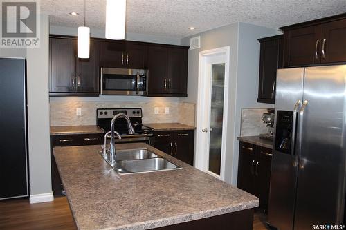 4249 Green Olive Way, Regina, SK - Indoor Photo Showing Kitchen With Double Sink With Upgraded Kitchen