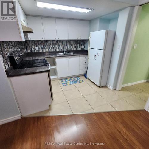 #Bsmt - 427 Starwood Drive, Guelph (Grange Hill East), ON - Indoor Photo Showing Kitchen With Double Sink