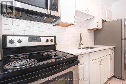 145 Victoria Avenue S, Hamilton (Stinson), ON - Indoor Photo Showing Kitchen With Double Sink