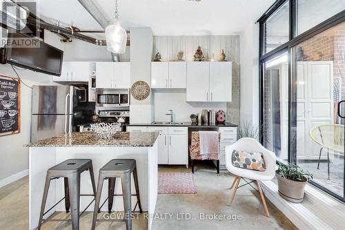 201 - 369 Sorauren Avenue, Toronto, ON - Indoor Photo Showing Kitchen With Upgraded Kitchen