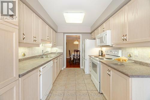 1705 - 35 Kingsbridge Garden Circle, Mississauga, ON - Indoor Photo Showing Kitchen With Double Sink