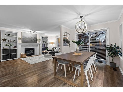 8484 215B Street, Langley, BC - Indoor Photo Showing Dining Room With Fireplace