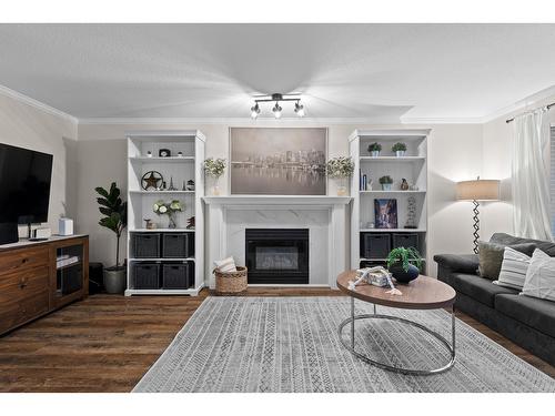 8484 215B Street, Langley, BC - Indoor Photo Showing Living Room With Fireplace