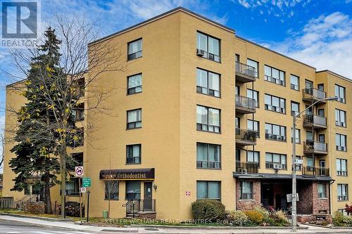 301 - 740 Eglinton Avenue W, Toronto, ON - Outdoor With Balcony With Facade