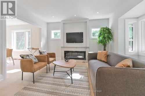 3 Haig Avenue, Toronto, ON - Indoor Photo Showing Living Room With Fireplace