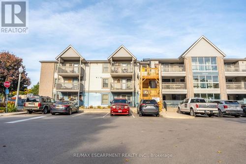 109 - 2010 Cleaver Avenue, Burlington, ON - Outdoor With Balcony With Facade