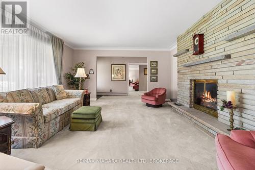 6235 Brookfield Avenue, Niagara Falls (216 - Dorchester), ON - Indoor Photo Showing Living Room With Fireplace