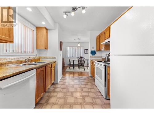 1830 Atkinson Street Unit# 103, Penticton, BC - Indoor Photo Showing Kitchen With Double Sink