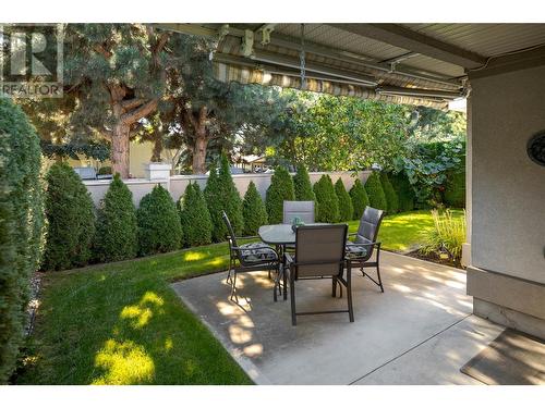 Private, landscaped outdoor space with an awning - 3788 Bird Place Unit# 145, Kelowna, BC - Outdoor With Deck Patio Veranda