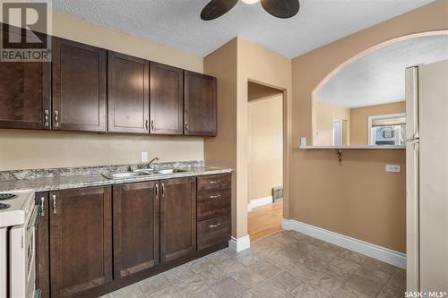 134 G Avenue N, Saskatoon, SK - Indoor Photo Showing Kitchen With Double Sink