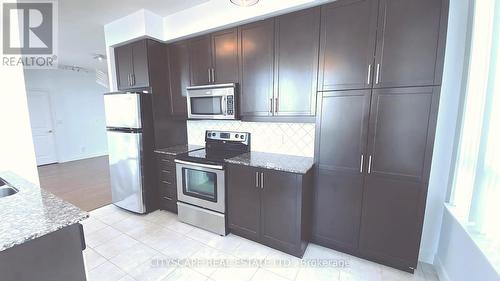 2709 - 80 Absolute Avenue, Mississauga, ON - Indoor Photo Showing Kitchen